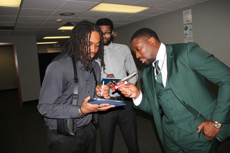 Absalute Management team members reviewing account details together